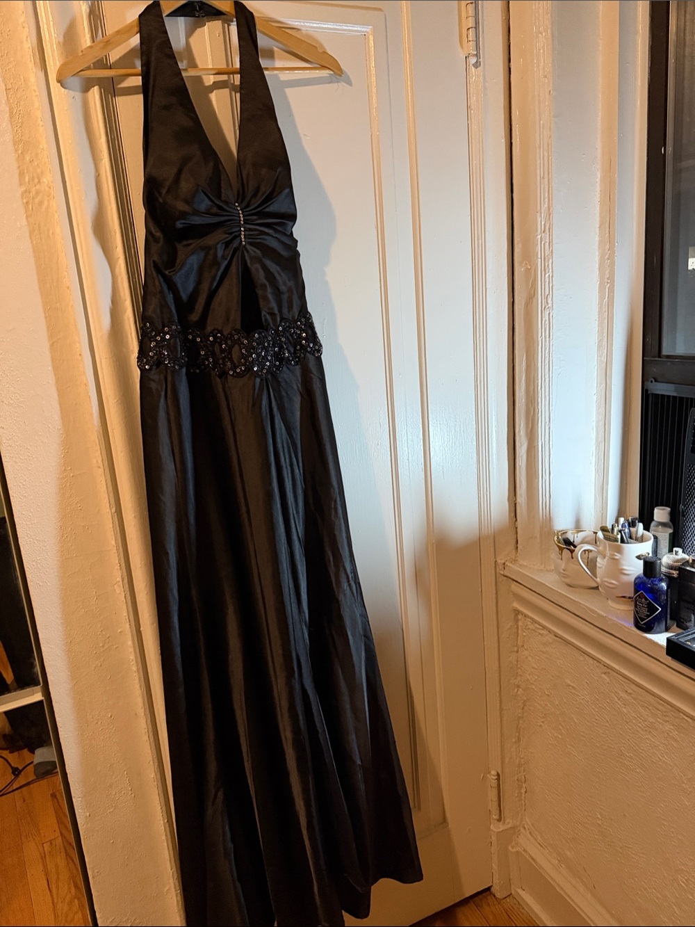 Elegant Black Halter-Style Prom Gown with Beaded Waist